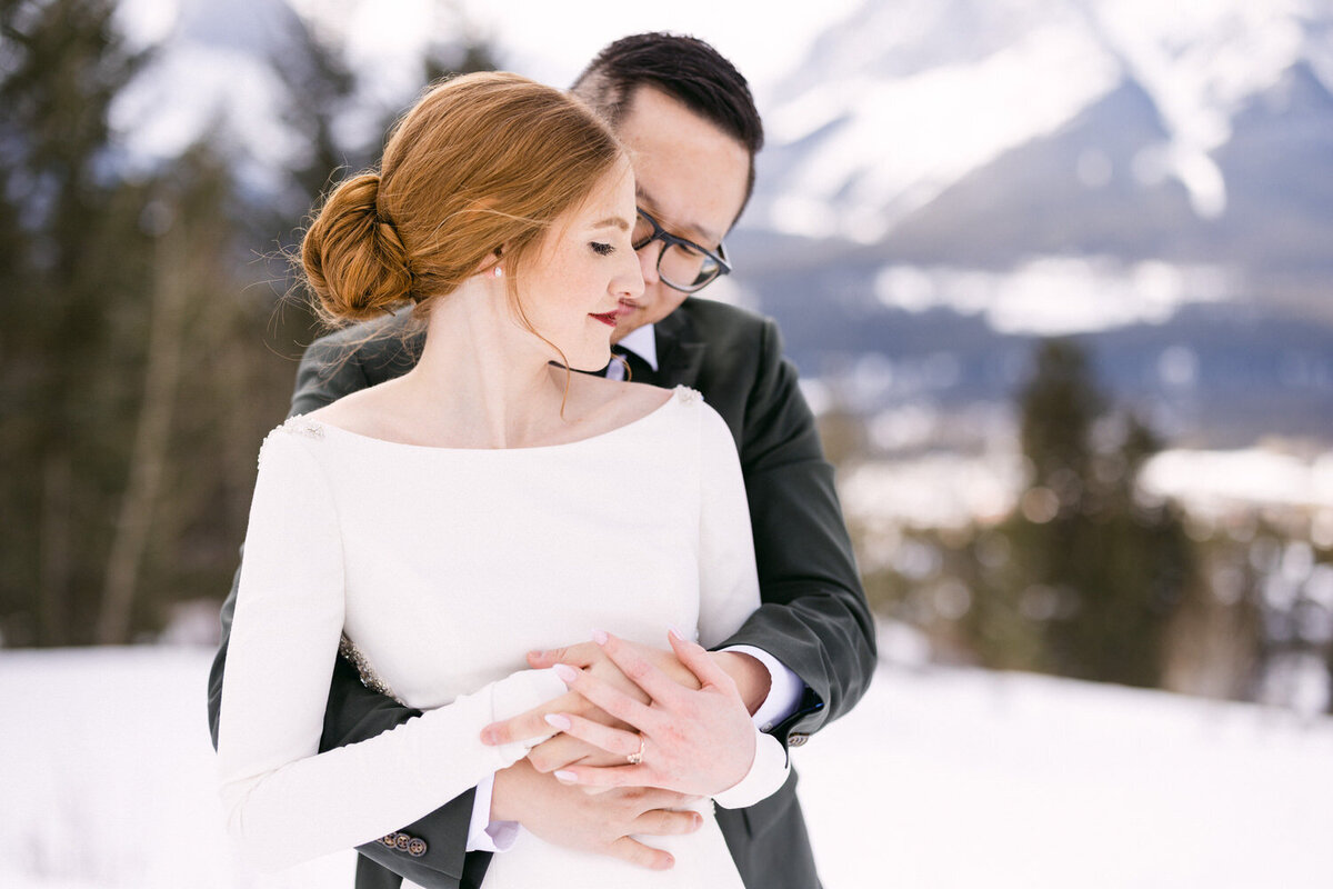 Natalie-Shawn-holding-each-other-at-Silvertip-Resort-Canmore-020