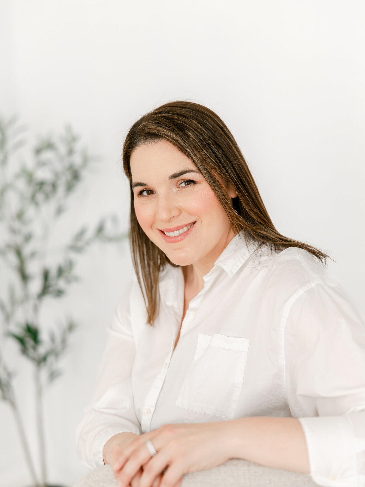 woman posing for headshot branding session