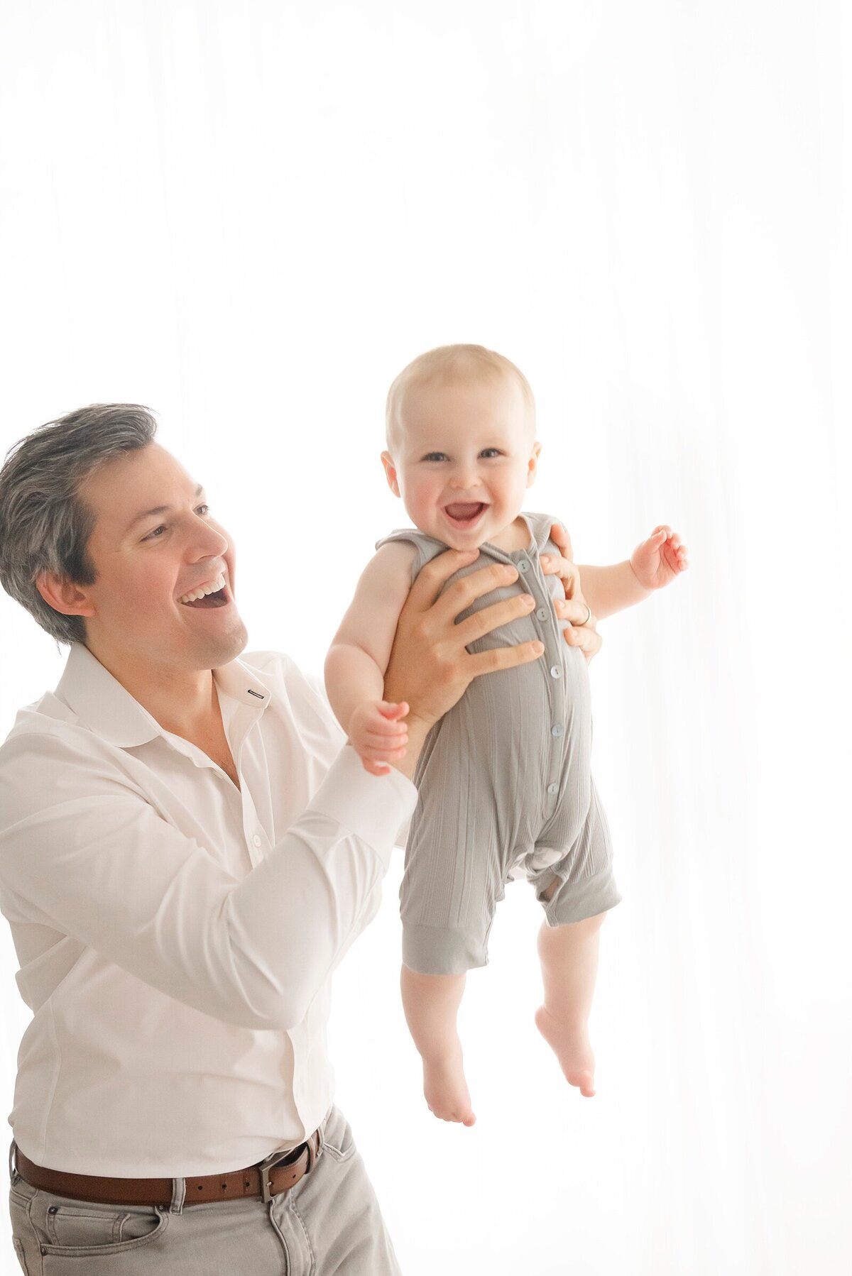 dad and son in studio by boston area family photographer​ Beth miga photography