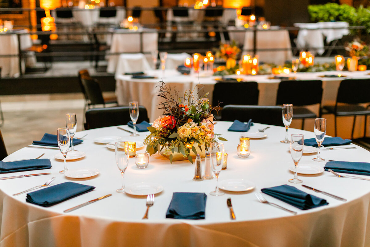 dinner-table-wedding-reception-blue-orange-roses-Eucalyptus