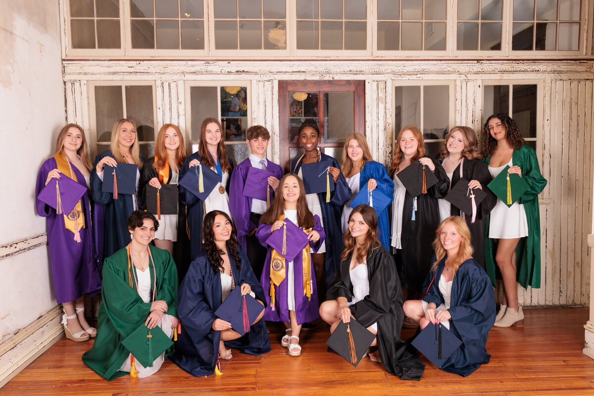 cap and gown portraits in downtown Raleigh for this senior model team.