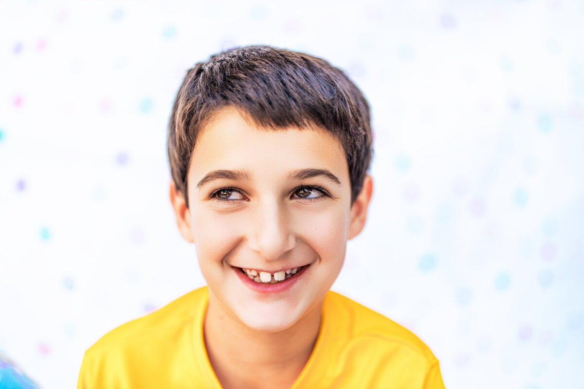 Photographer heidi iliff is excellent at getting the attention of Young boys and girls during photography shoots!