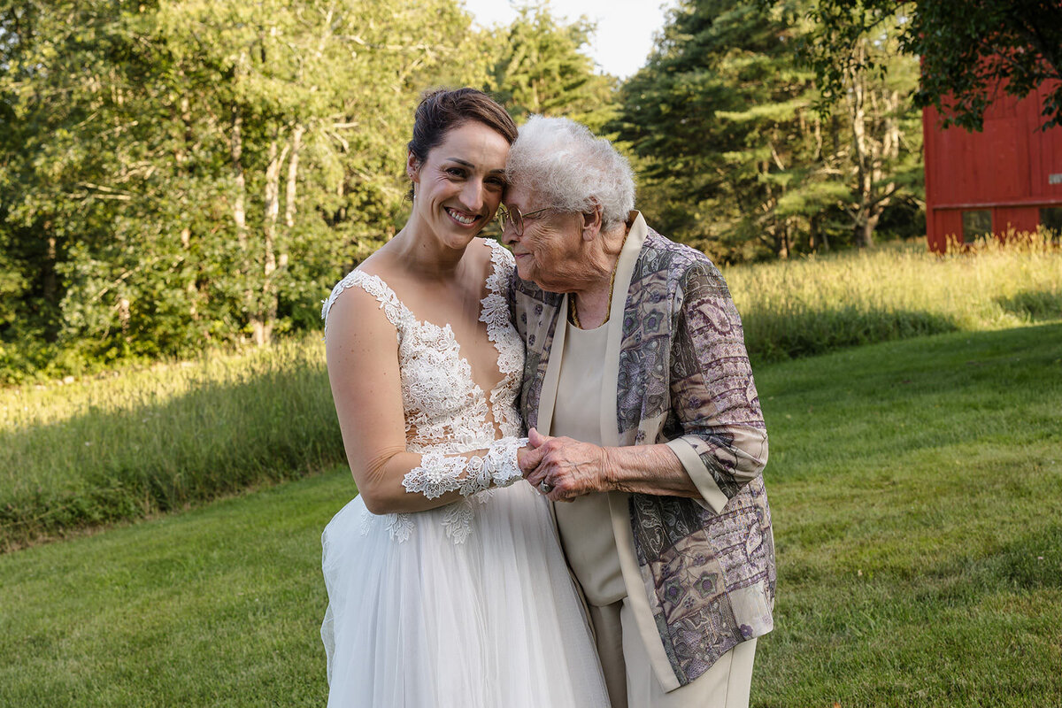 A person hugging their elderly relative