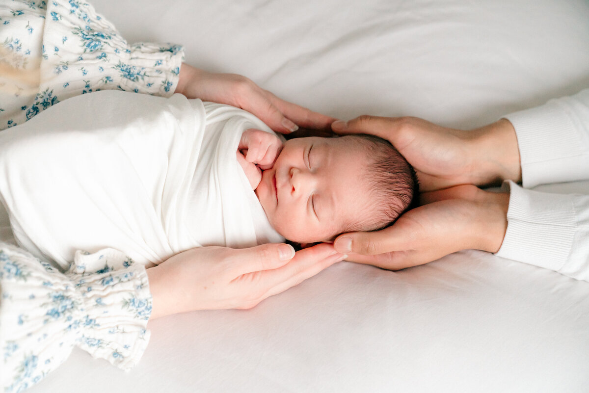 a swaddled newborn