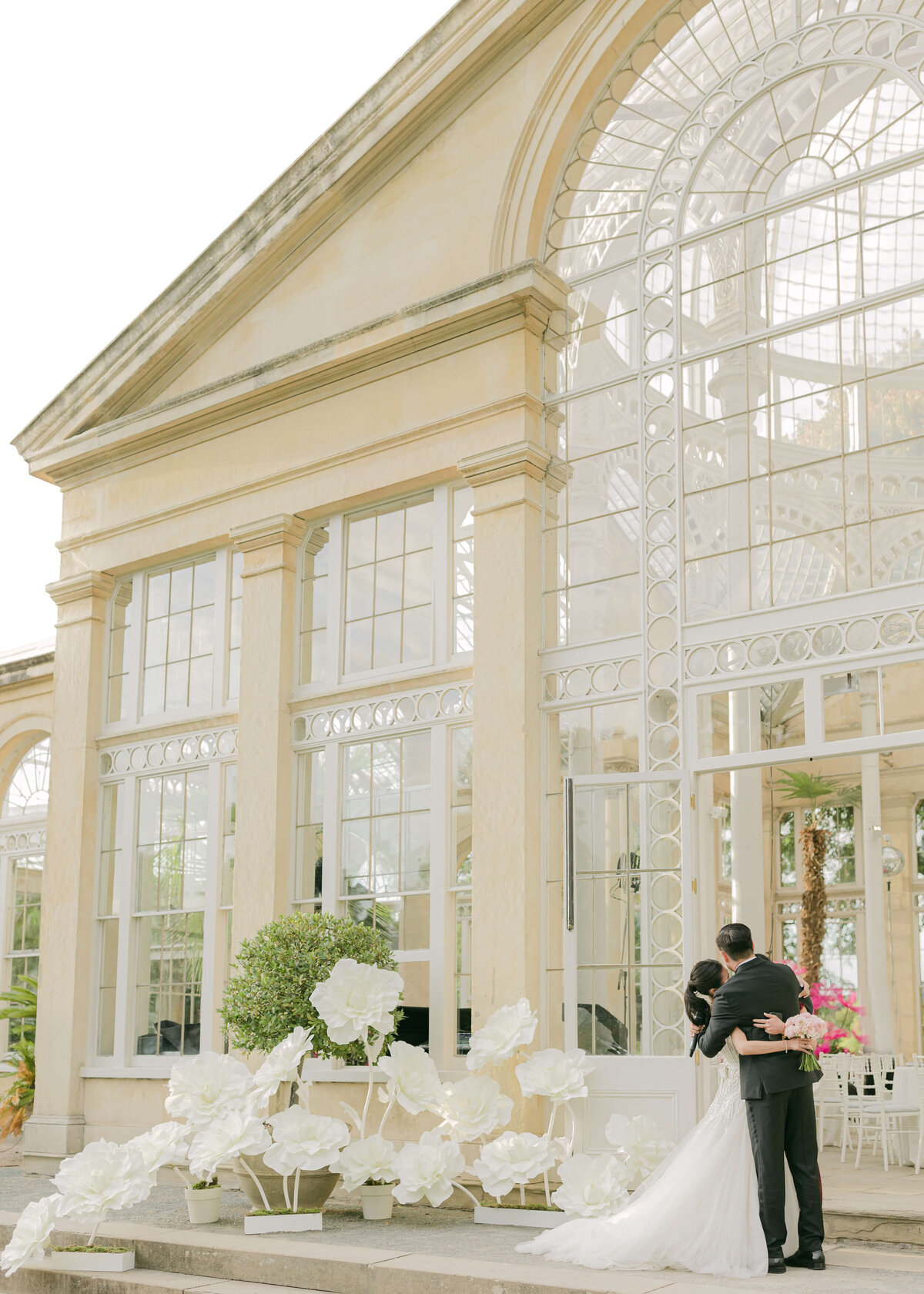 chloe-winstanley-weddings-syon-park-conservatory-couple-hug