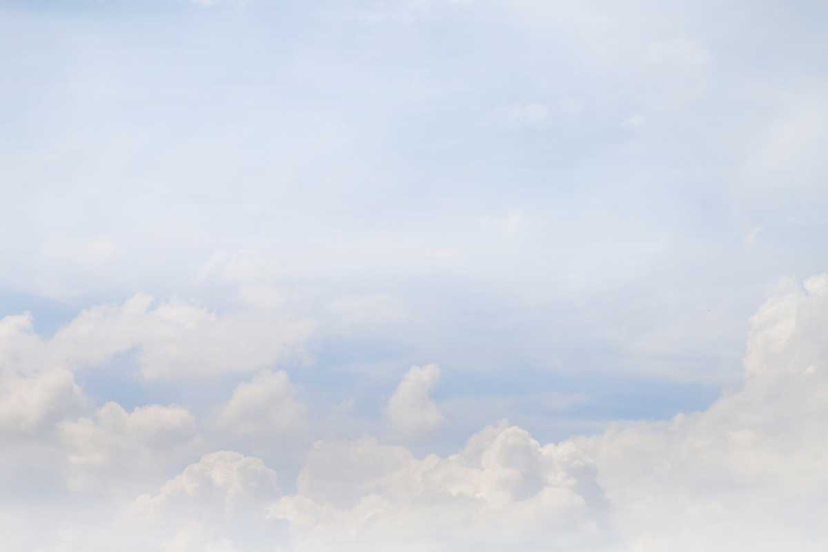 Soft clouds and a light blue sky