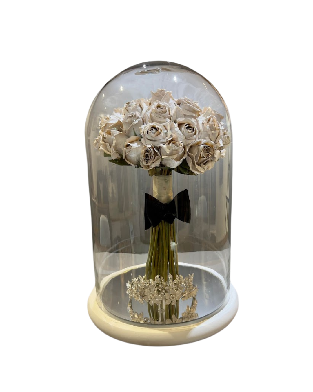 wedding bouquet preserved inside a dome.