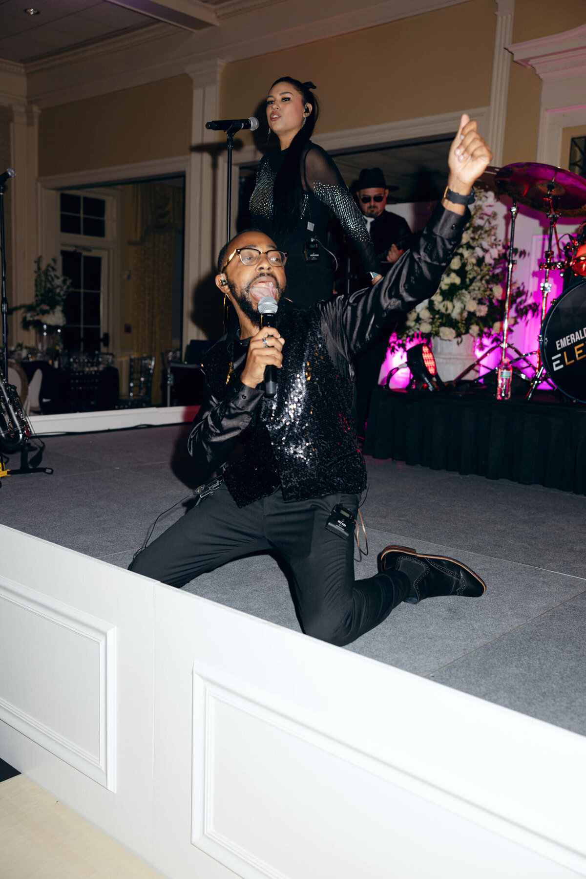 A wedding photo of the band during the wedding reception