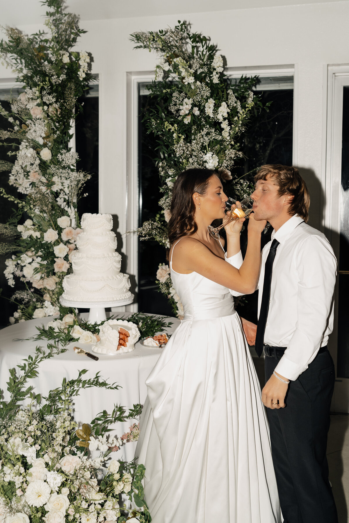 Bride and groom share a heartfelt moment in downtown Tulsa, captured by a wedding photographer.