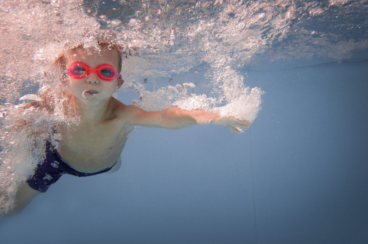 We are one of the area's premiere kids photographers specializing in underwater sessions