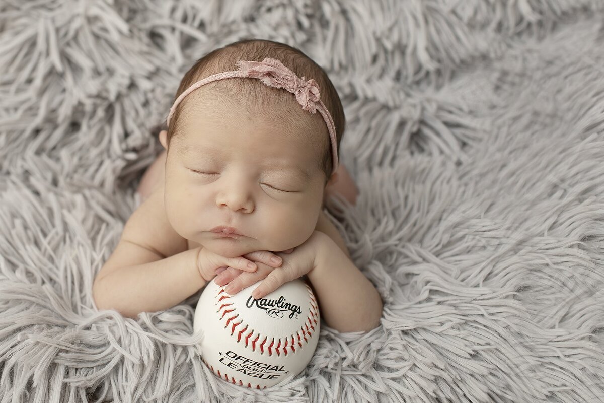 Newborn Girl with Baseball