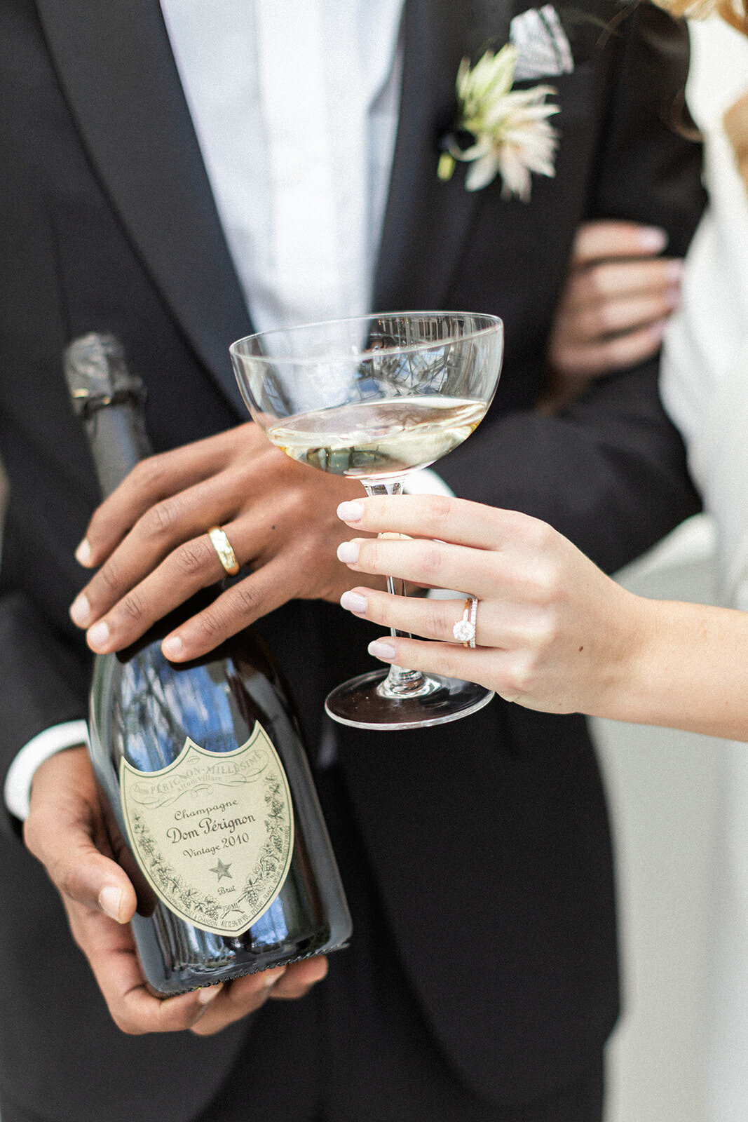 Kate-Murtaugh-Events-RI-wedding-planner-champagne-coupe-toast-diamond-ring