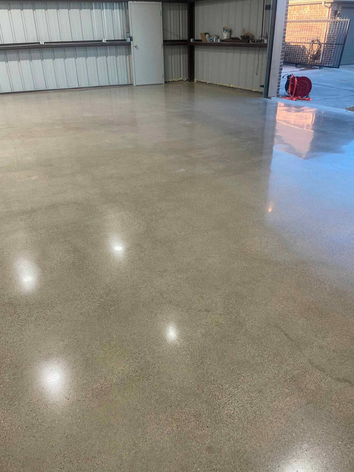 Professional Polished Concrete Installers in DFW working on a residential or commercial space, using advanced tools and techniques to deliver flawless, high-quality polished concrete floors in the Dallas-Fort Worth area.