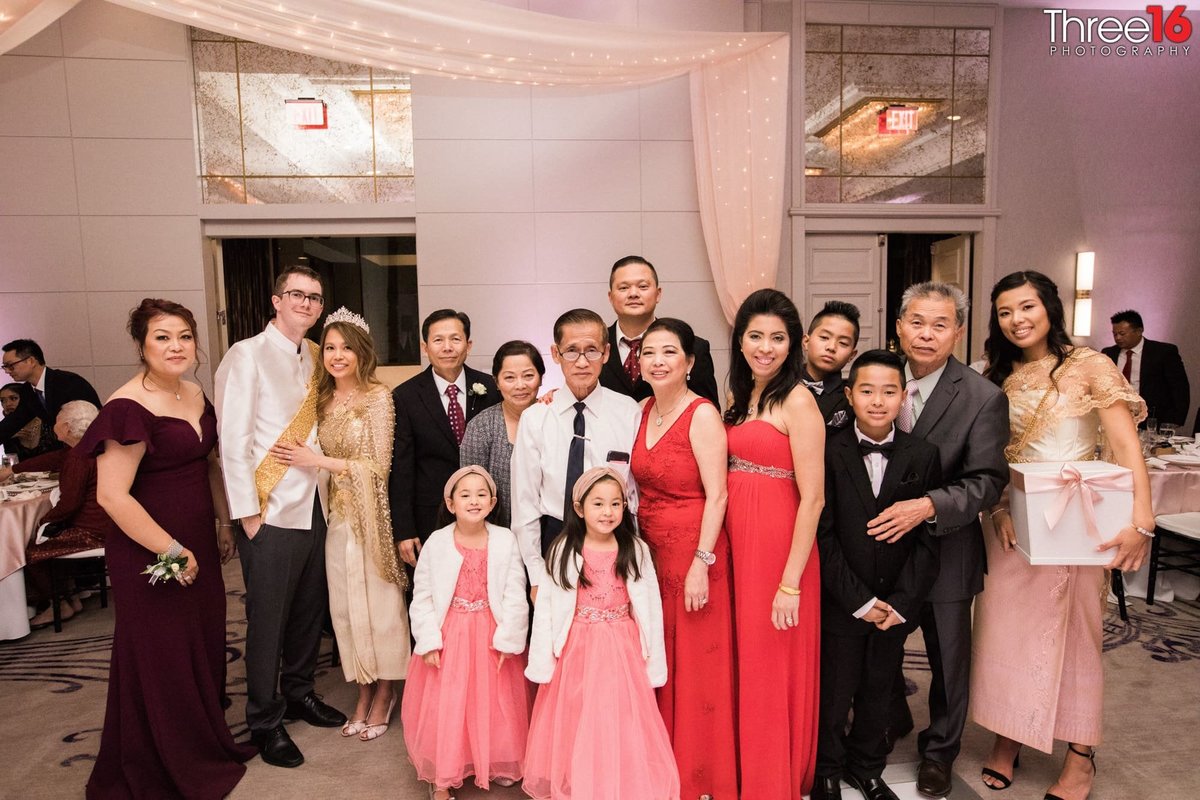 Family photo during wedding reception