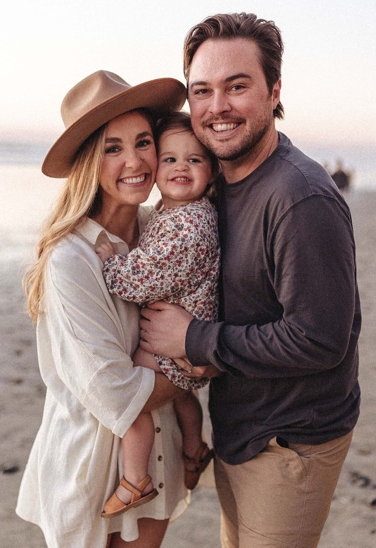 Smiling family of 3