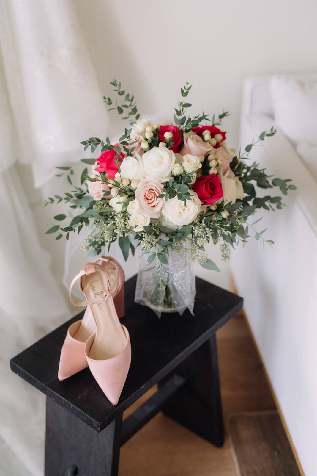 Floral arrangement at shoes sat on a table