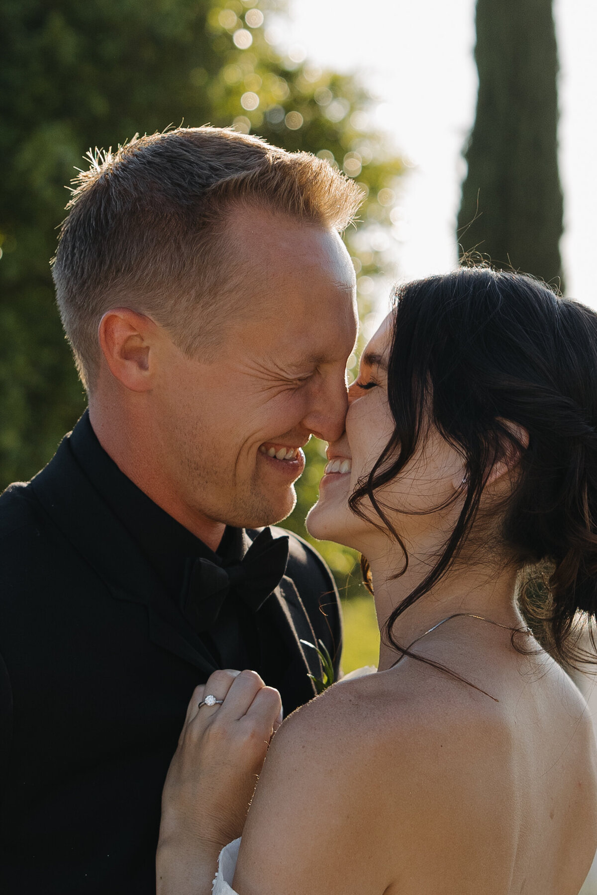 bride and groom about to kiss 