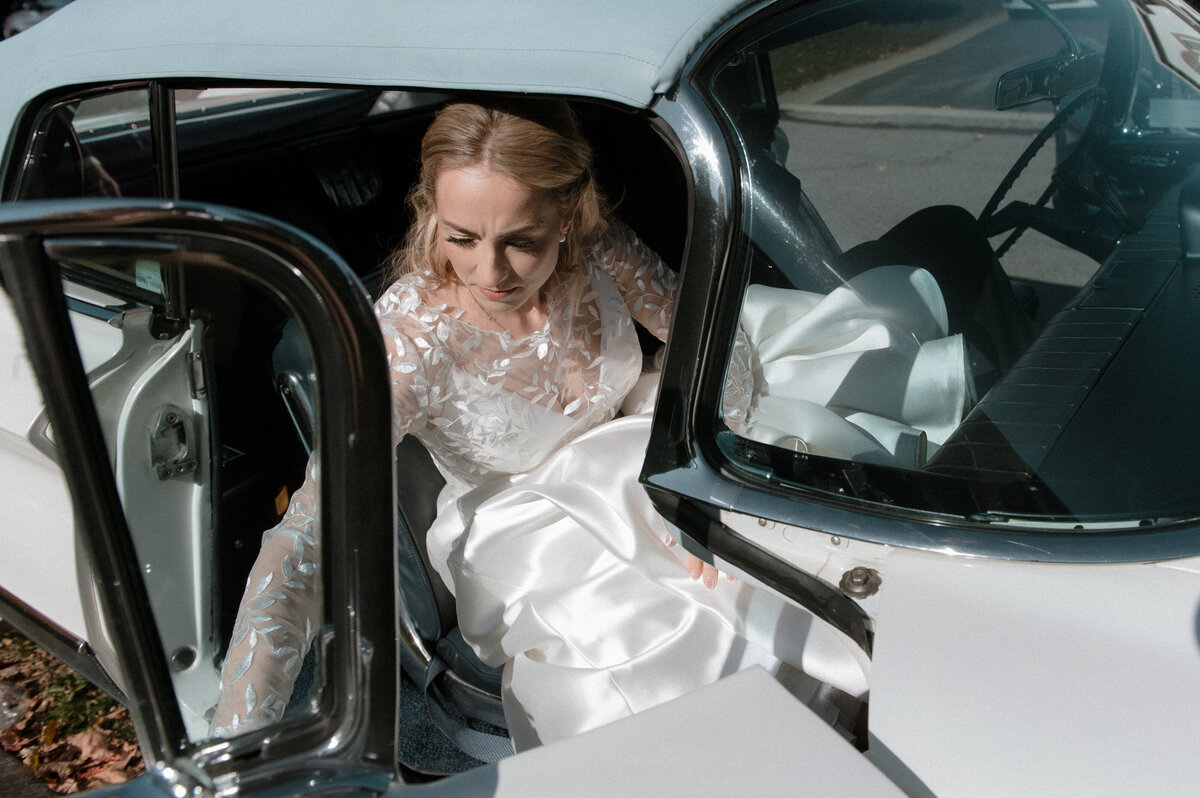 Bride in a vintage car