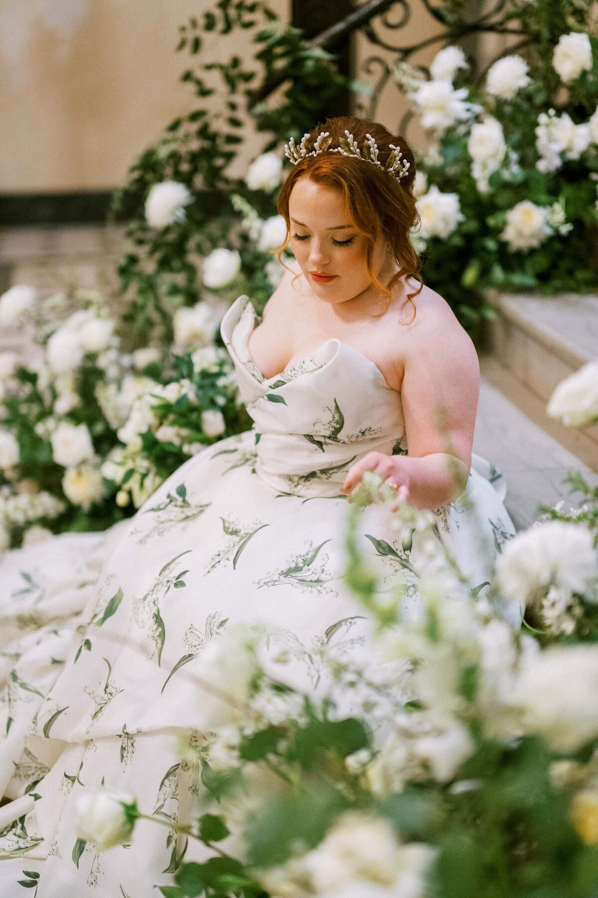 bride-on-floral-covered-stairs