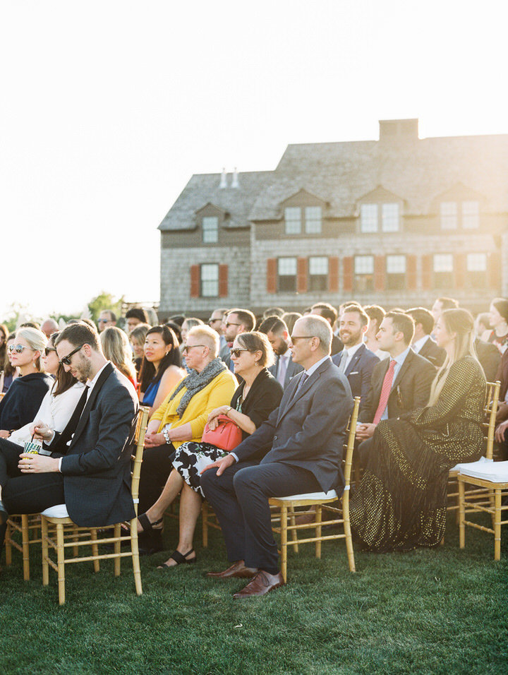 guests at cguests at a ceremony at weekapaug inn wedding in westerly rhode island