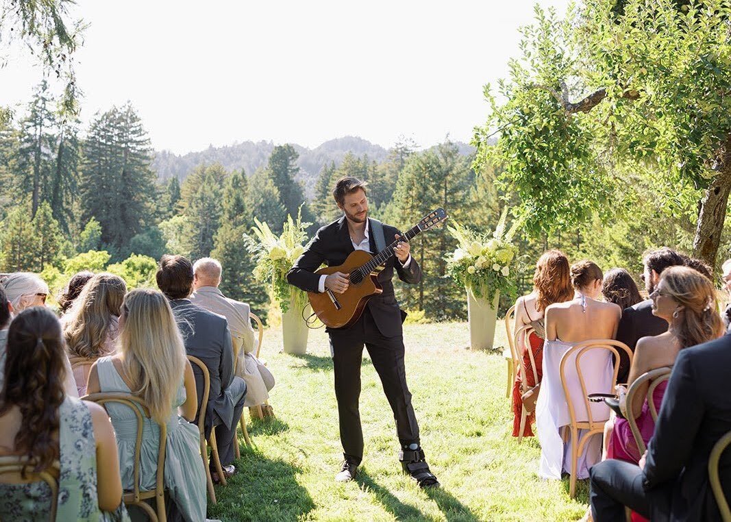 Austin Texas acoustic wedding guitarist performing live during a luxury outdoor destination ceremony