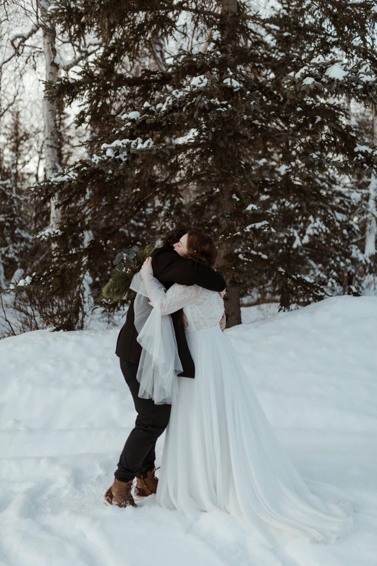 bride and groom embracing