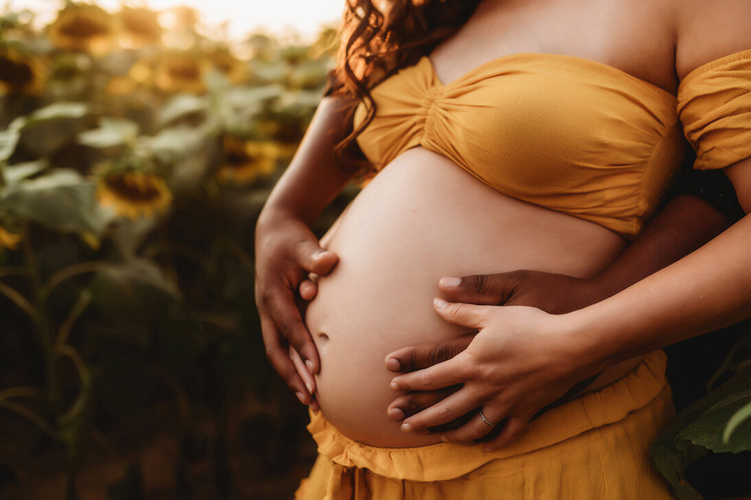 Pregnant woman poses for Maternity Photoshoot in Charleston, SC.