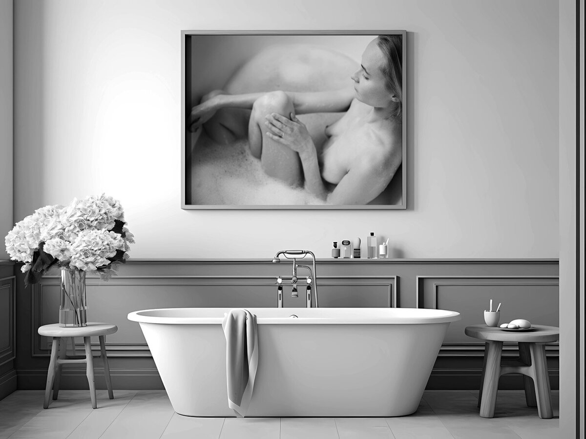 Bathroom decorated with a large printed boudoir portrait of a woman bathing