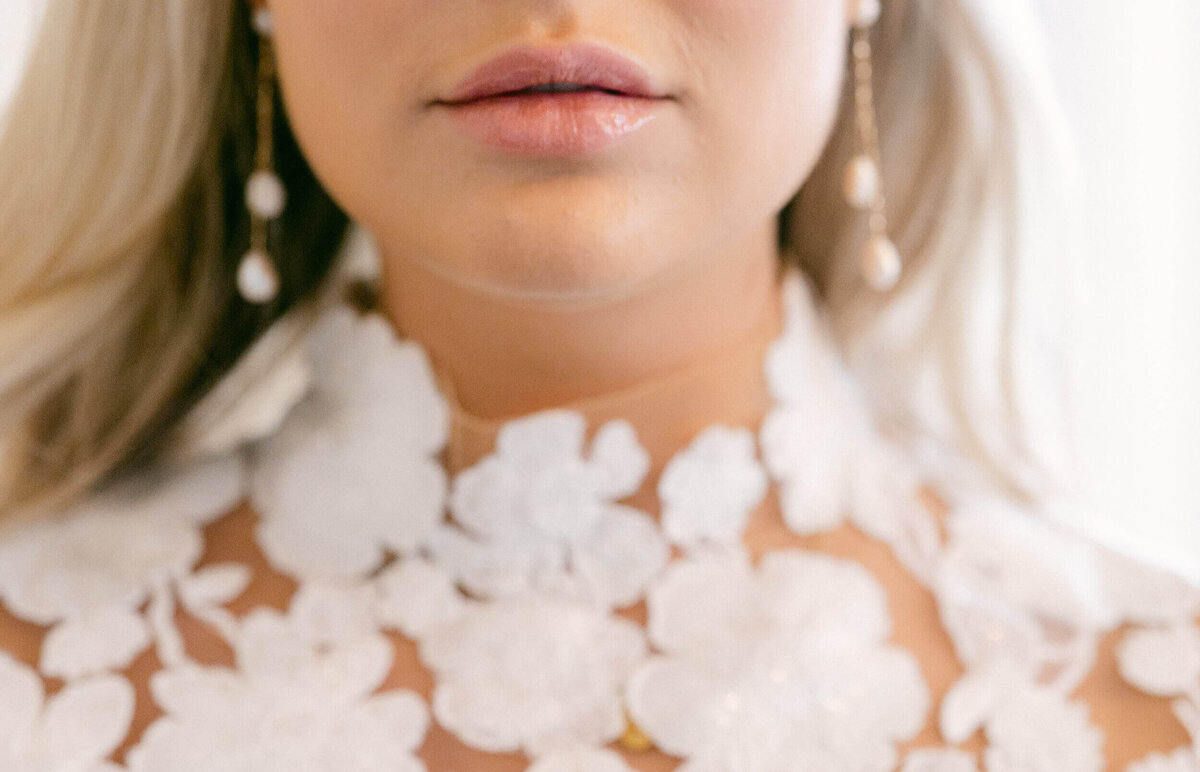 A wedding day portrait of the bride in her white wedding dress at Hedsor House in the UK