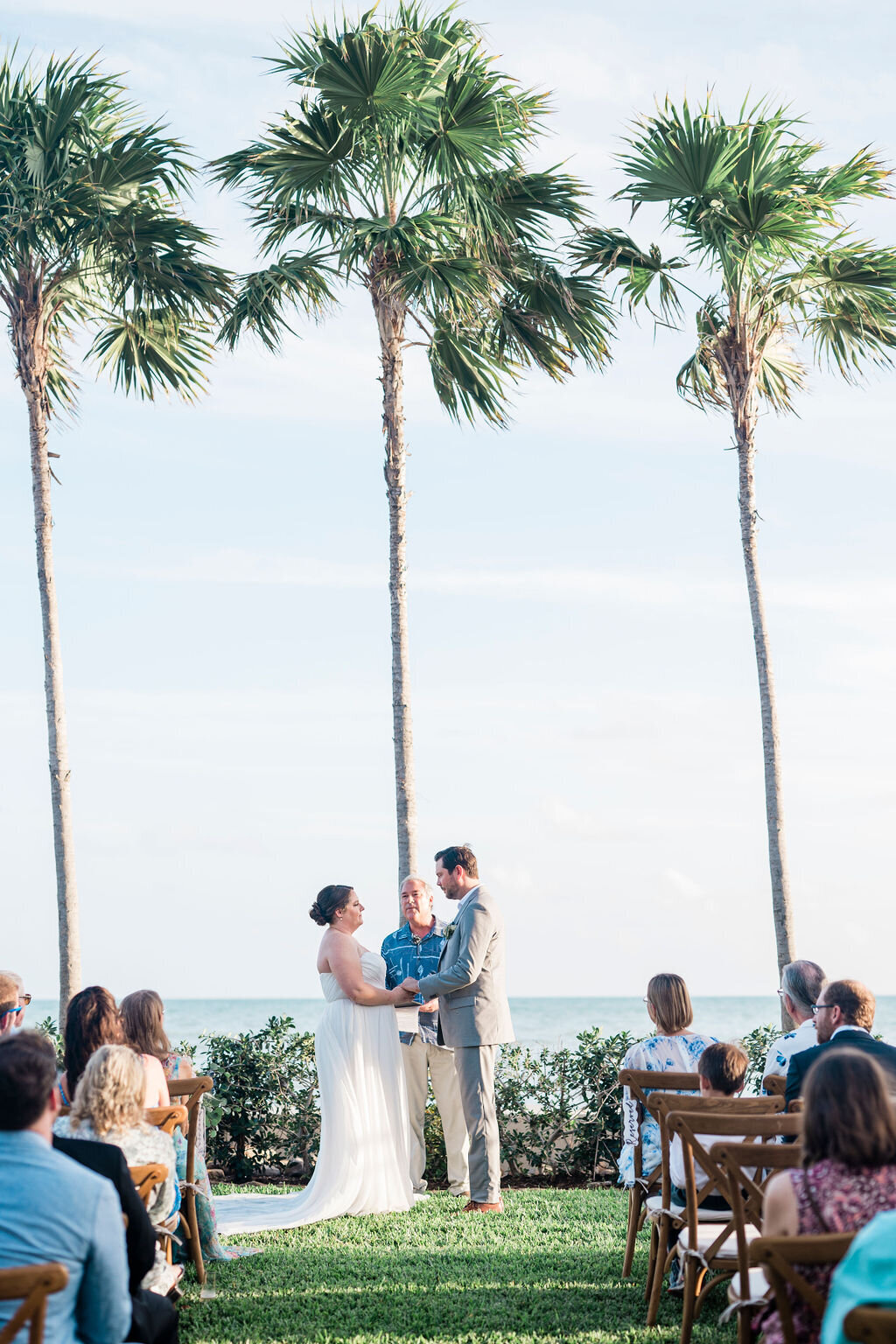 A bride and groom say their vows at their Key West wedding