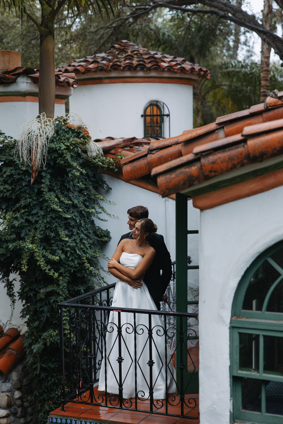 rancho las lomas wedding, bride and groom on balcony