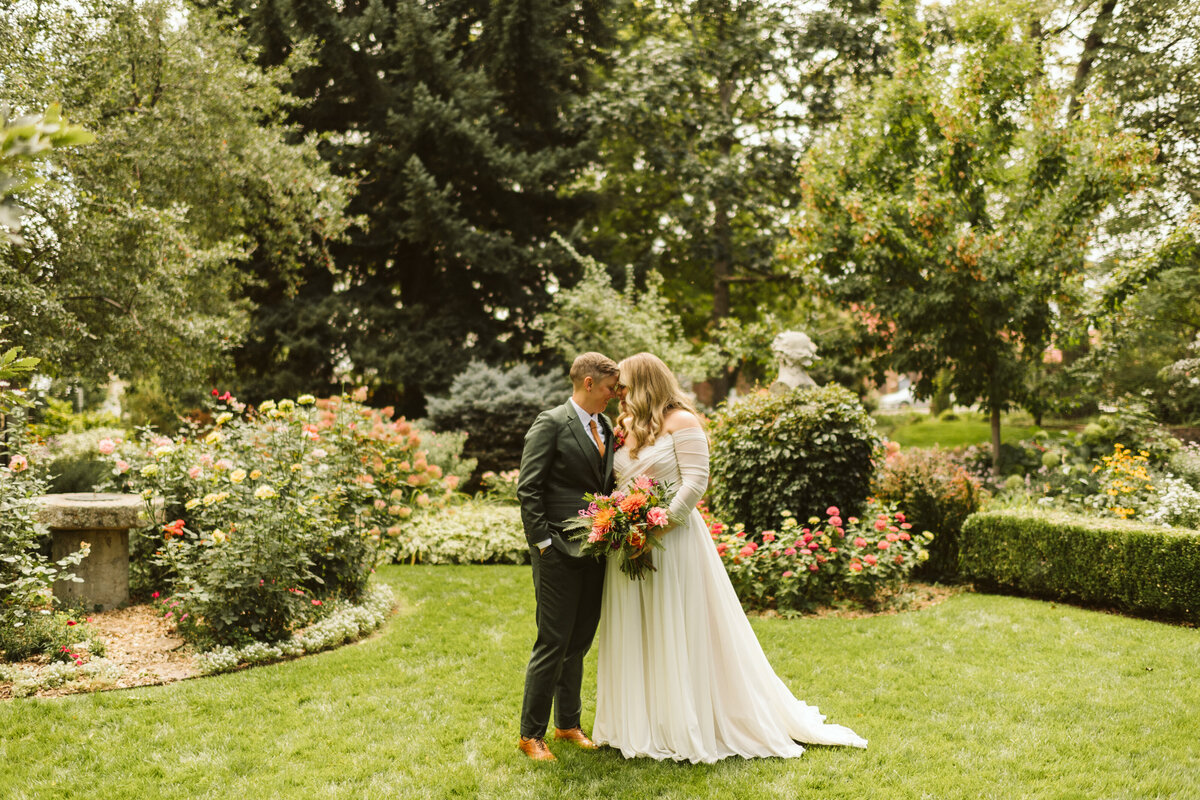 Bride and groom at outside colorful wedding at the St Vrain wedding venue