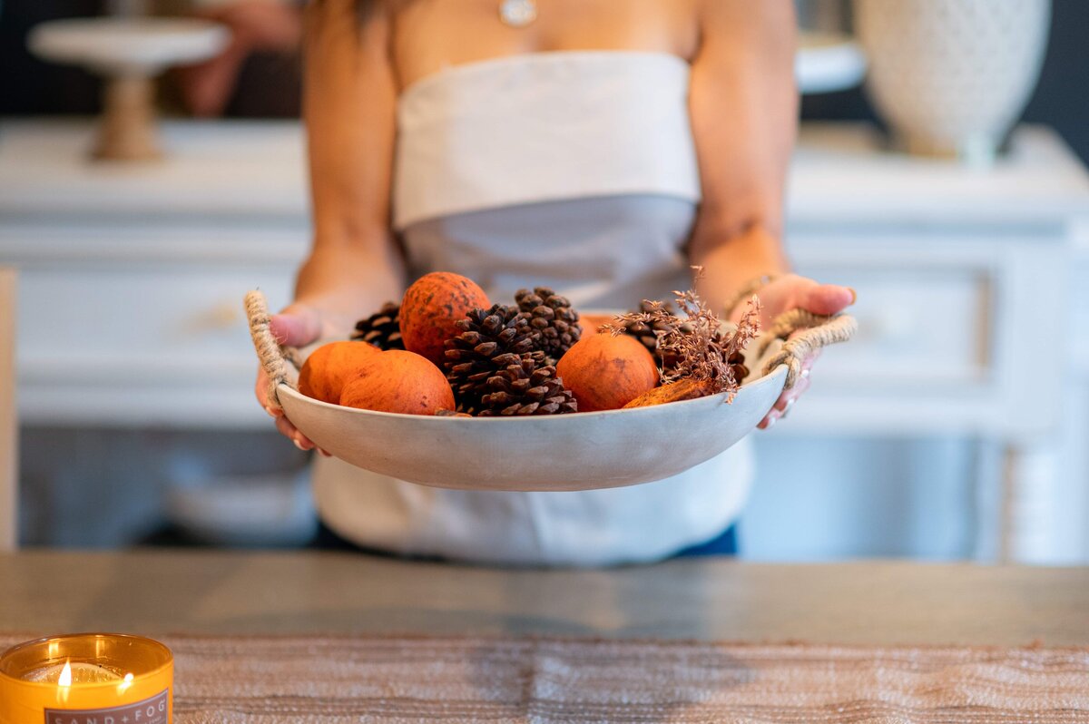 Lifestyle branding photos in Williamsburg Virginia – home staging professional at work