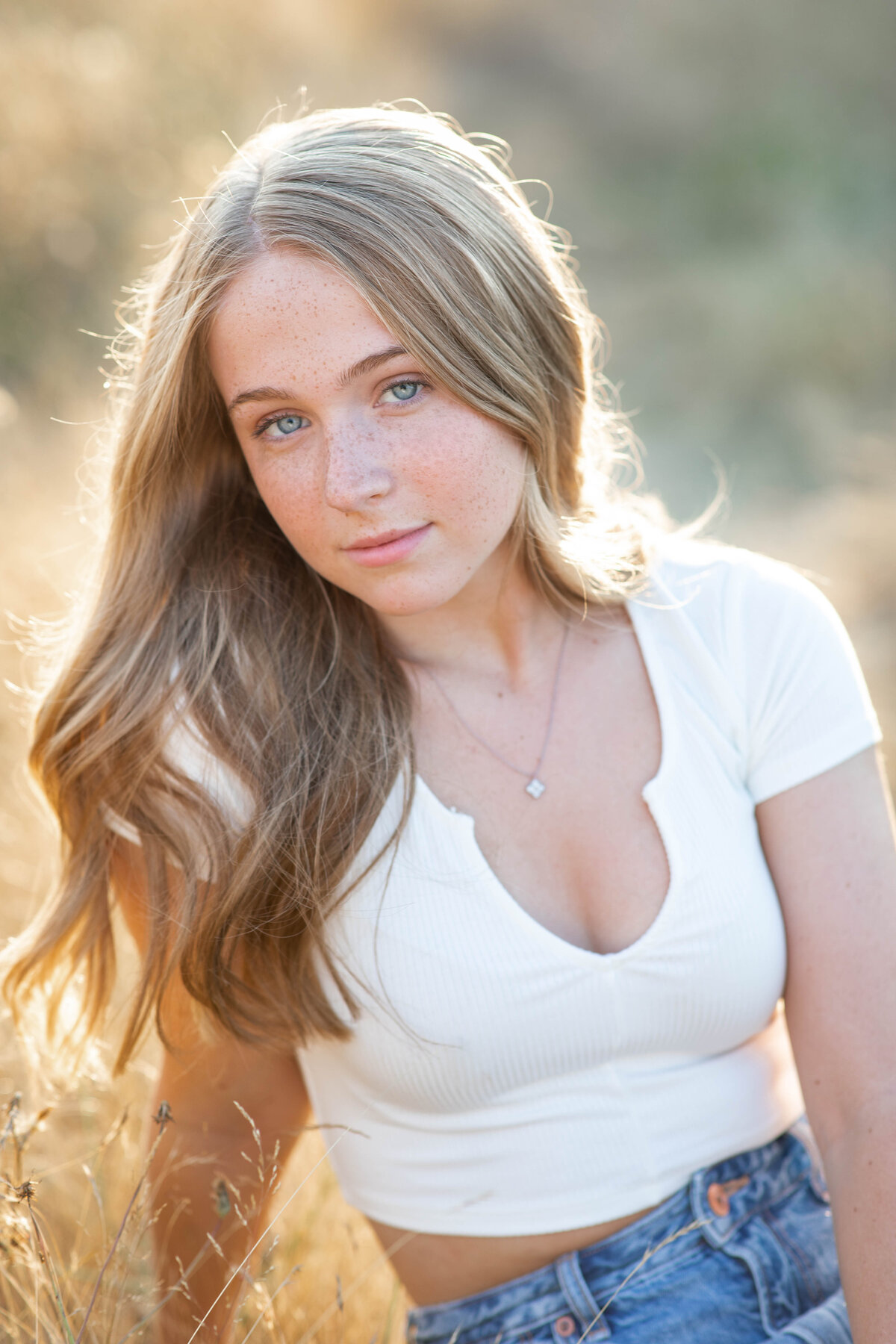 Senior girl sitting in field Discovery Park WA