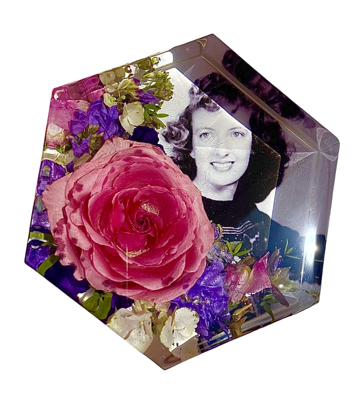 hexagon resin block with pink and purple funeral flowers preserved alongside loved ones photo as a timeless family keepsake