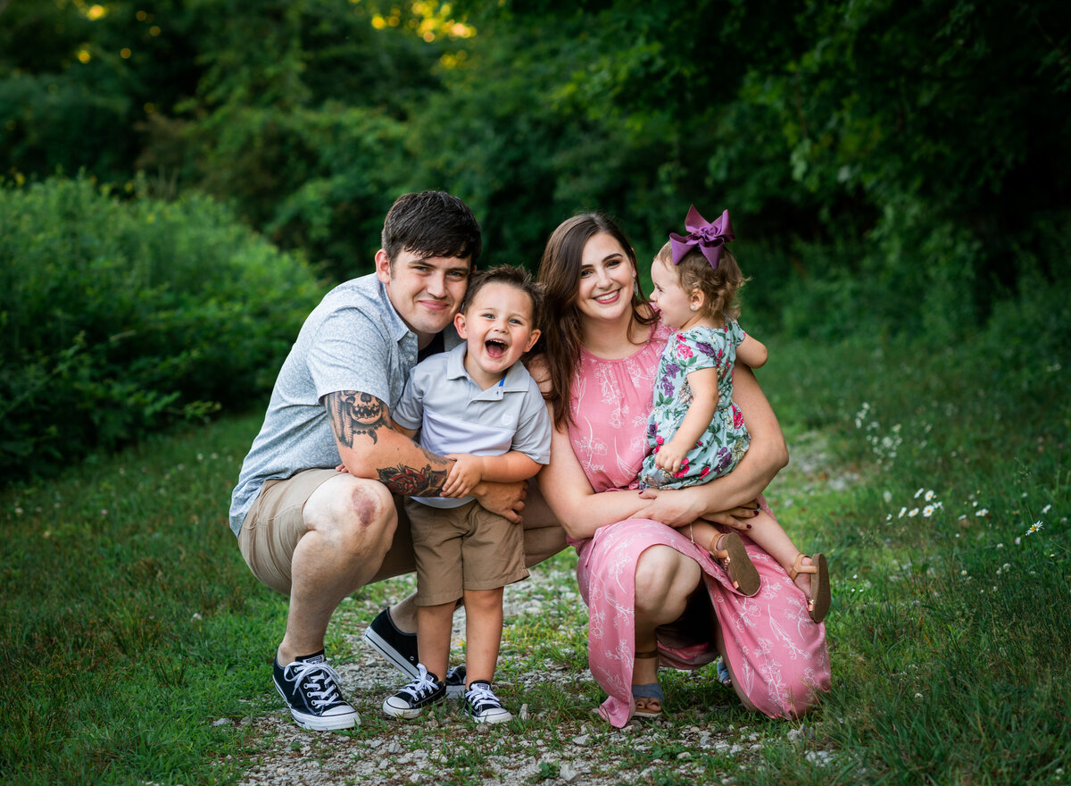 Joyful family portrait capturing smiles and love, beautifully photographed by Leslie Q Photography
