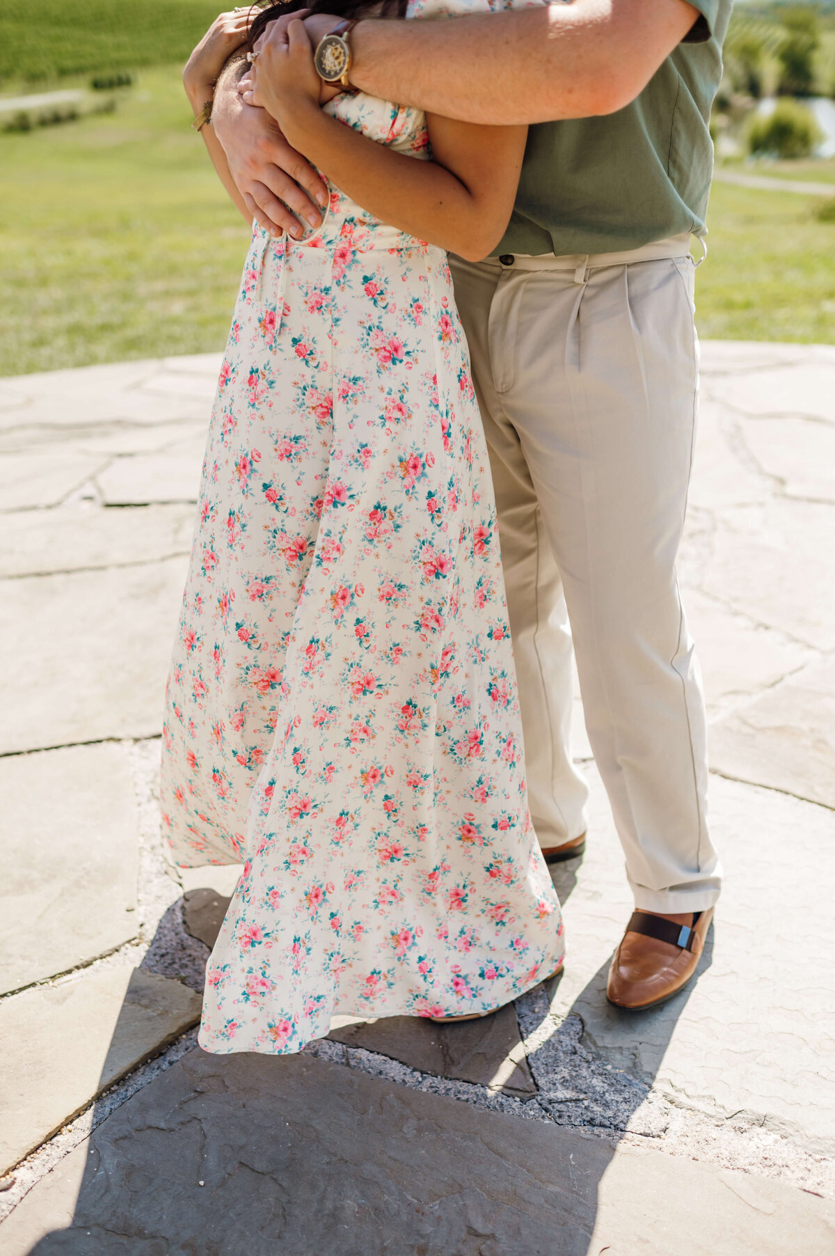 charlottesville wedding photographer photographs man and woman hugging each other in their outfits for what to wear for engagement photos