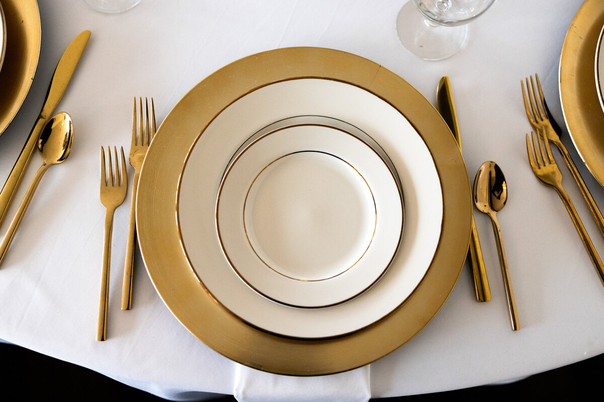 gold plate and place setting