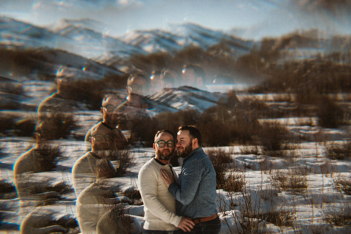 two men pose together with refractory glass effect
