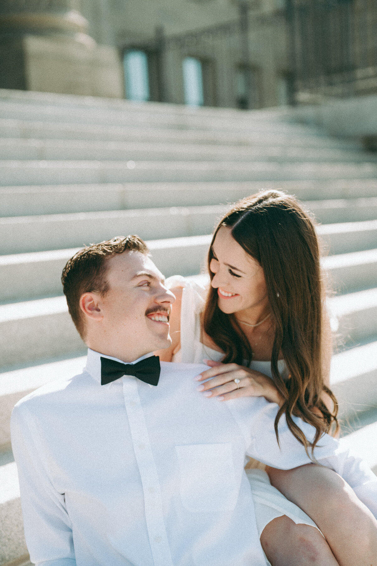 Couple during golden hour engagement shoot in Boise, Idaho wedding/elopement - photographed by The Storytellers