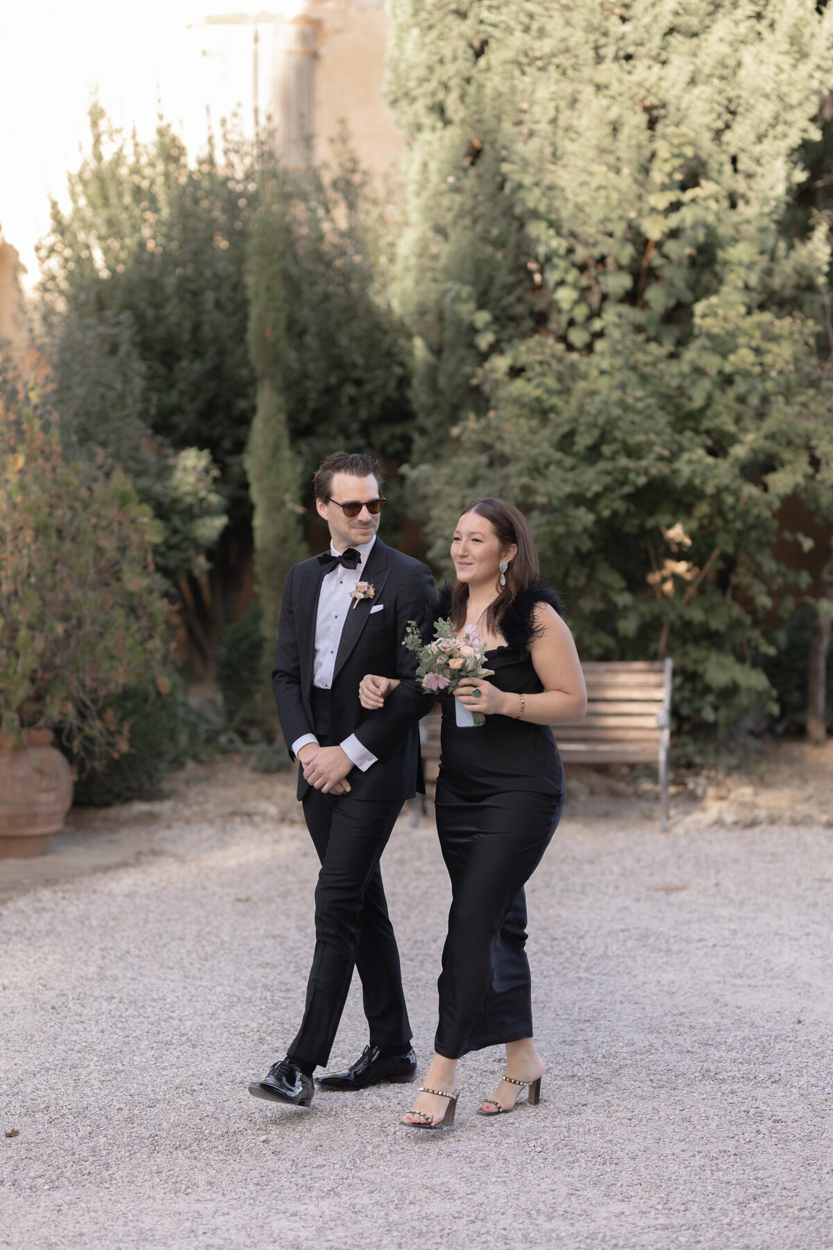 Wedding guests make their entrance at the Tuscan wedding ceremony