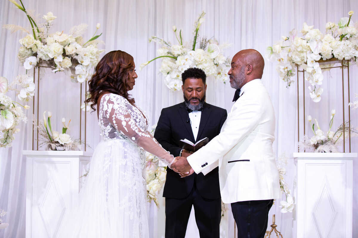 southern-exchange-ballroom-atlanta-wedding-ceremony-exchanging-vow