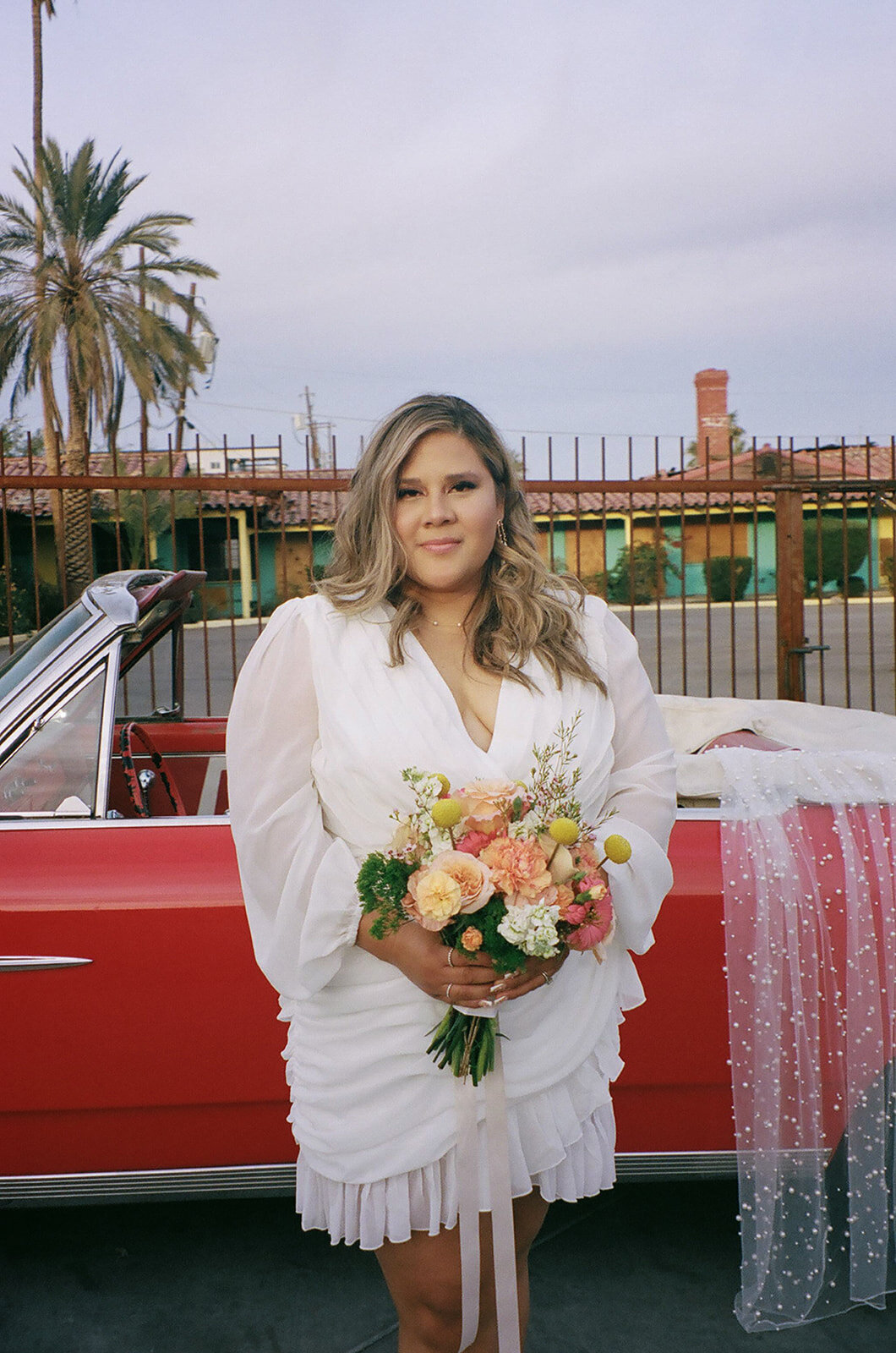 Bride detail shot with classic car Las Vegas