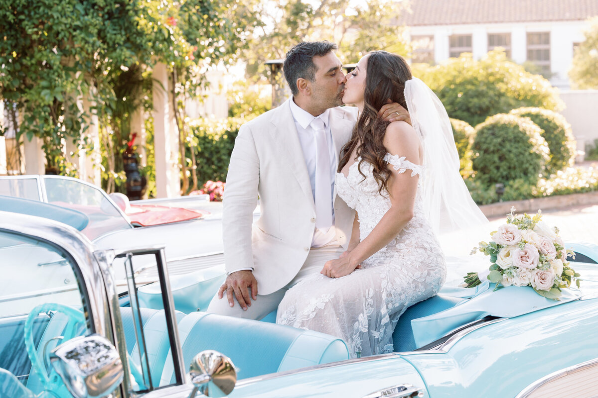 Bride and groom kissing