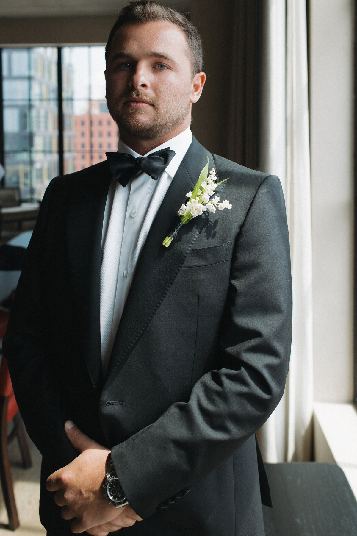 Film photography captures editorial bridal elegance at NOBU Hotel Chicago with Lauren Alatriste's fashion forward approach, creating luxury wedding imagery that combines sophisticated editorial aesthetics with authentic preparation moments.