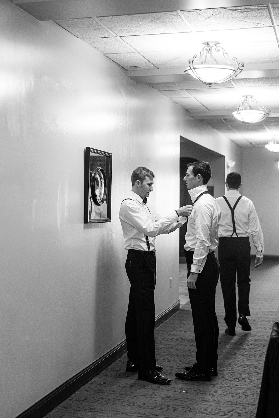 groomsmen getting ready for wedding shot by Philadelphia photographer.