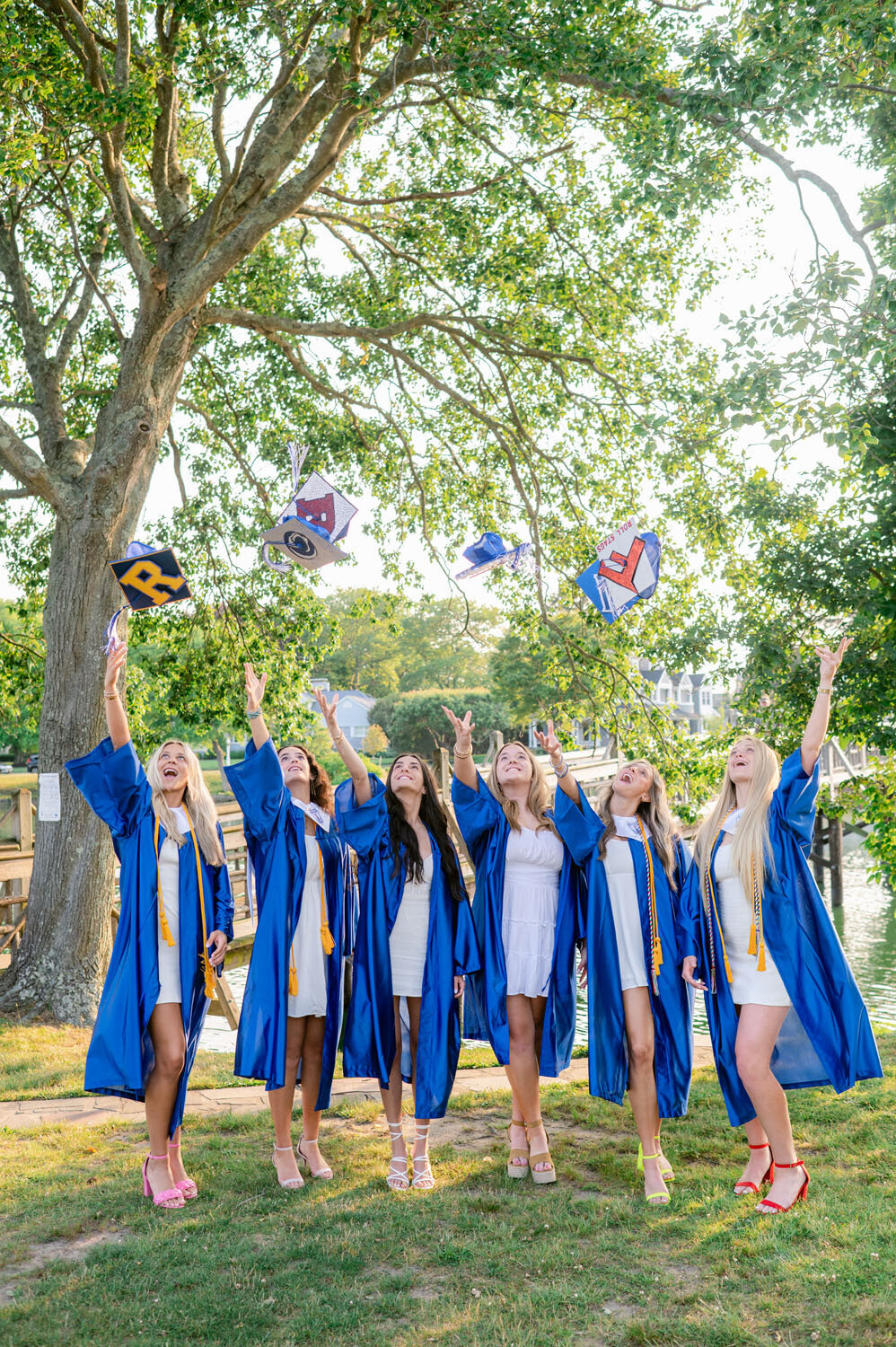 NJ senior photoshoot fun friends shoot cap and gown spring lak sea girt beach shoot white dresses-381