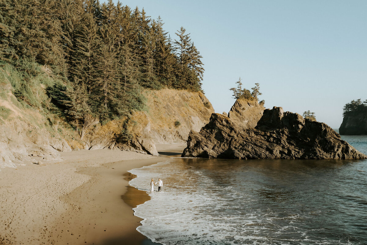 couple wading in the water 