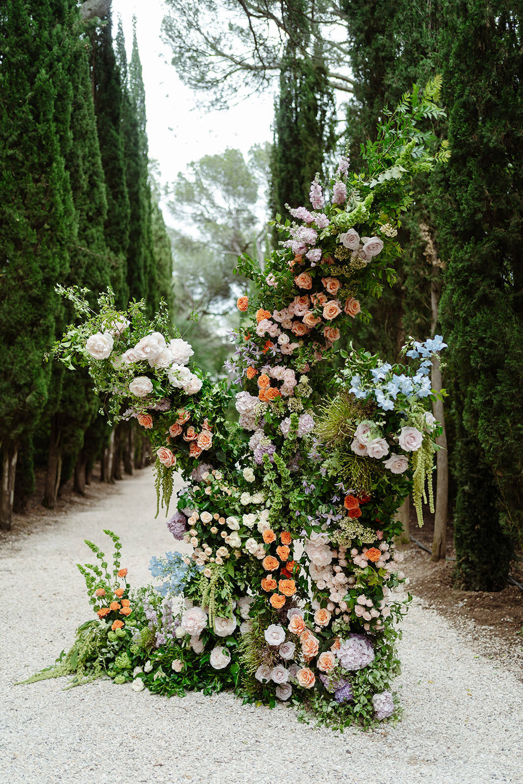 colorful asymetrical floral arch