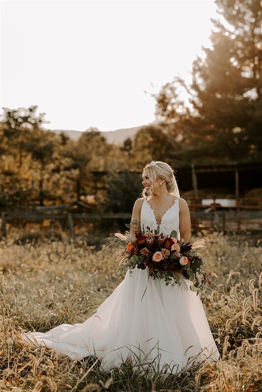 Bride enjoying a  quiet moment at the Silverbrook Farm